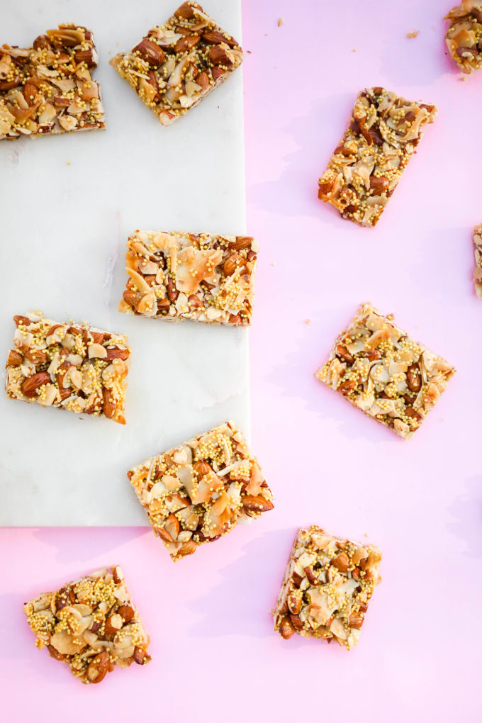 homemade granola bars on pink and marble slab