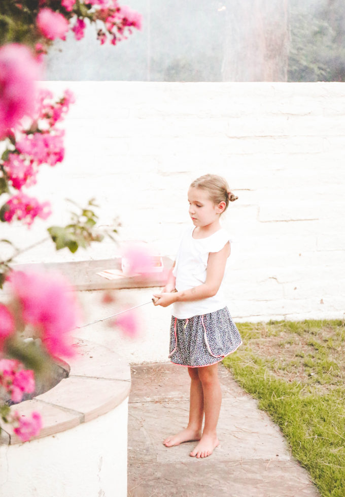 little girl roasting marshmallows 