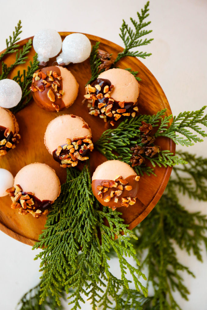 chocolate macarons with chopped pecans