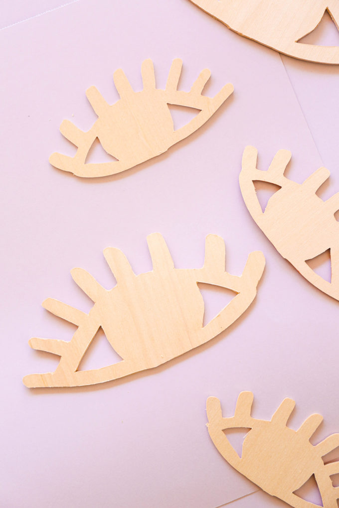 wooden eye-shaped valentines cut from a Cricut Maker 