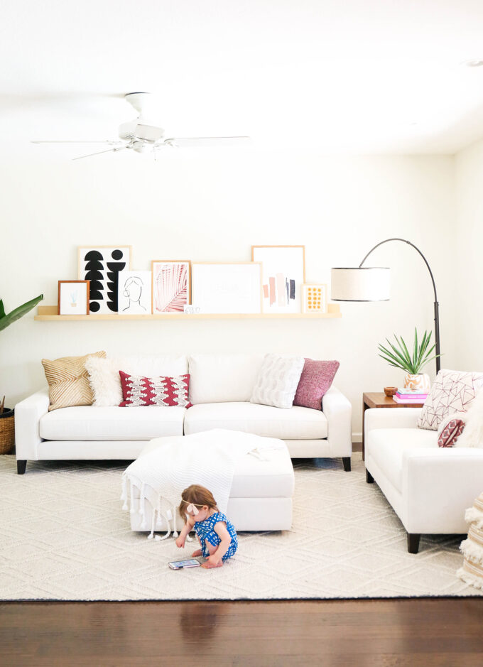 baby playing in modern living room 