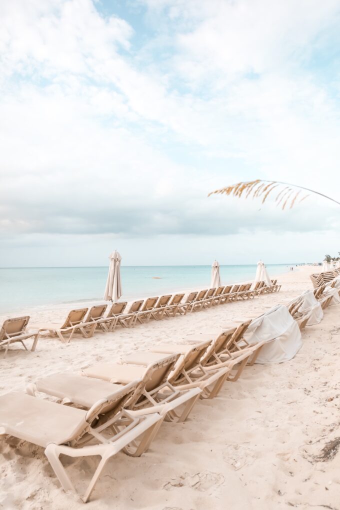 beach chairs near ocean 