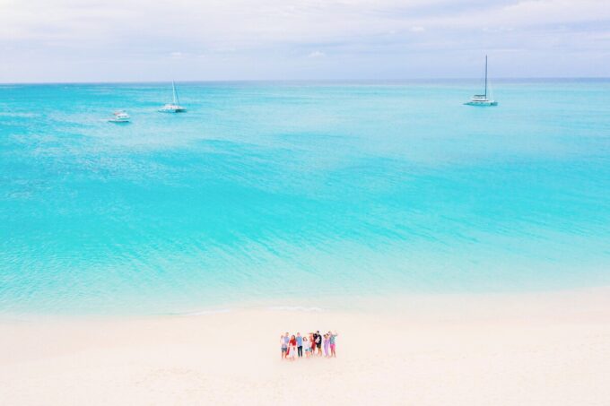 aerial view of group of friends on beach 