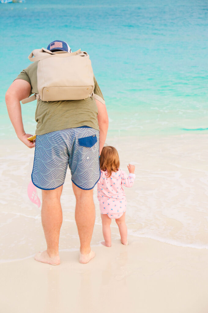 father and daughter on beach 