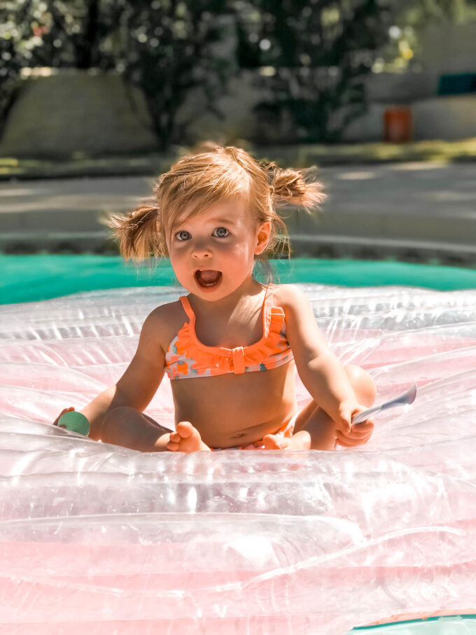 toddler girl in swimsuit