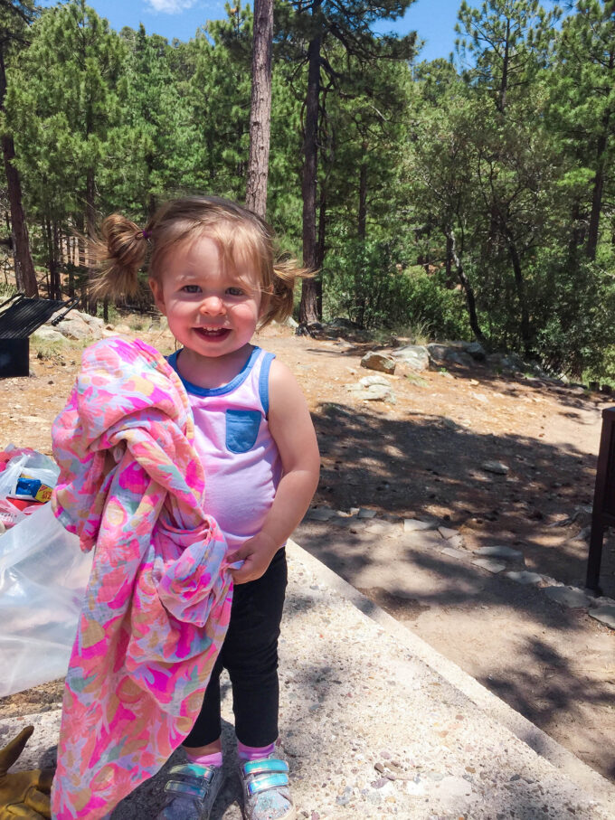 toddler posing while camping