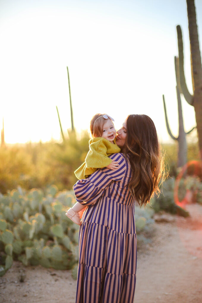 mom holding baby 