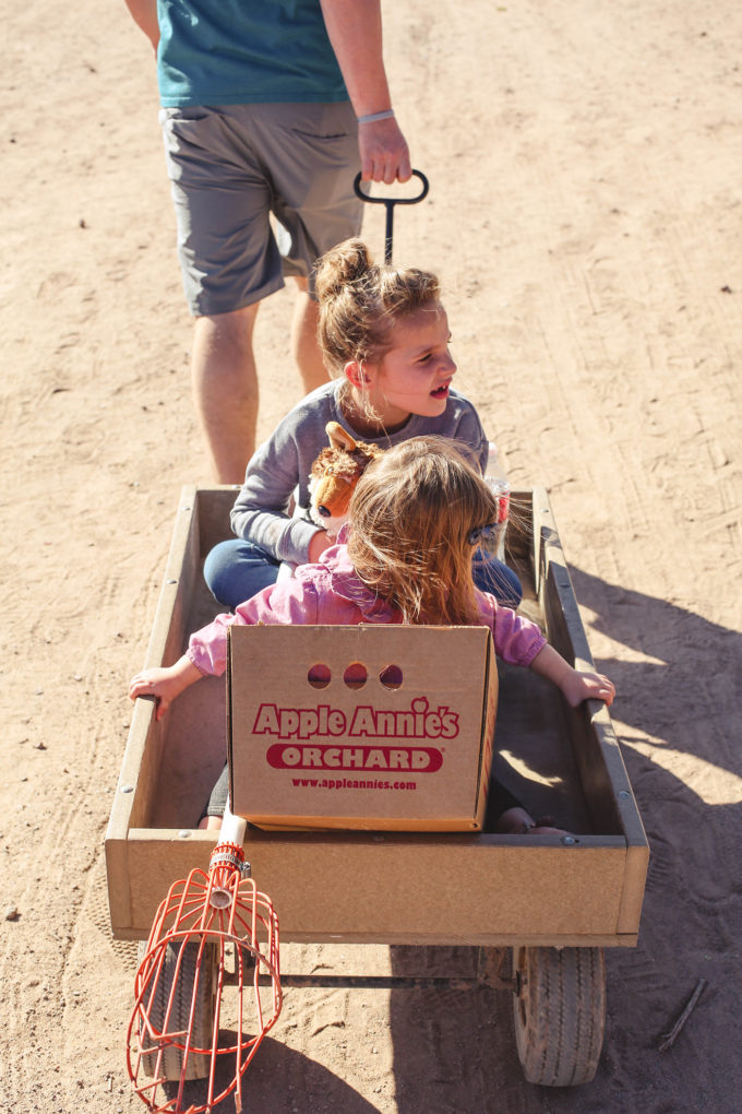 kids sitting in wagon 