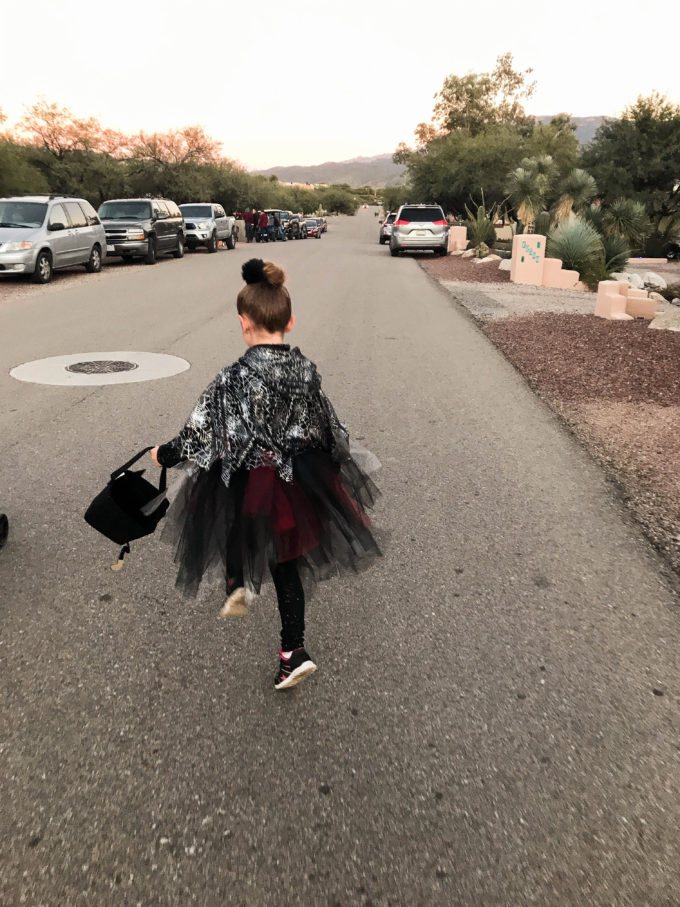 vampire girl sipping in road 