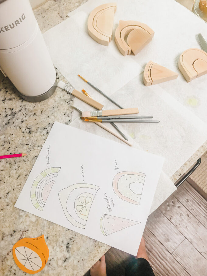 wooden rainbow cutouts with plan for coloring and design