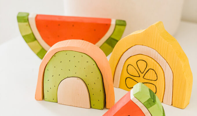 closeup of wooden fruit stacking toys