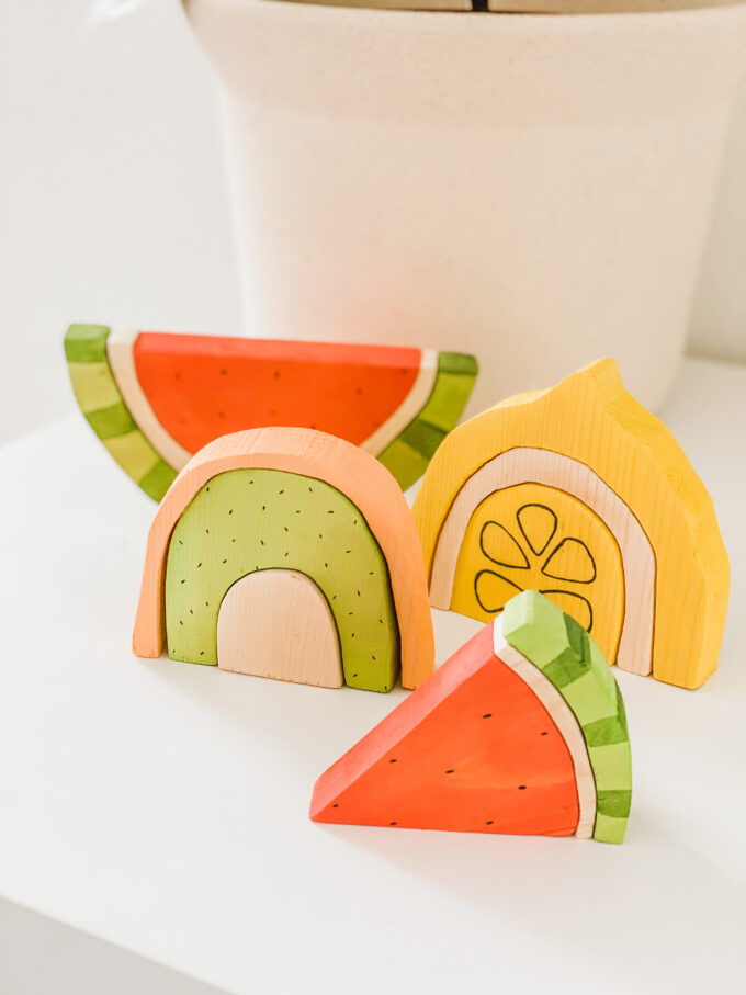 closeup of wooden fruit stacking toys